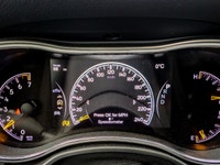 Introducing the stunning 2019 Jeep Grand Cherokee Limited 4x4, a vibrant orange SUV that promises an... (image 7)