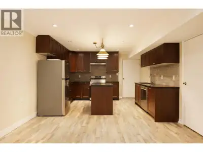 Wow! Rare updated suite in central but private residential neighborhood. This above ground main floo...