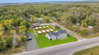 2,200 SqFt Dual-Purpose Property Just Minutes from Grand Beach!