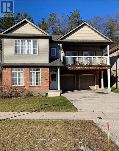 Modern and bright this lovely main level of legal duplex has an inviting open concept with large win...