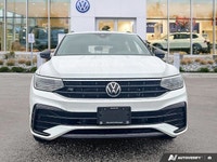 This Volkswagen Tiguan delivers a Intercooled Turbo Regular Unleaded I-4 2.0 L/121 engine powering t... (image 7)