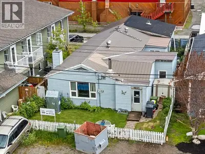 A smart downtown INVESTMENT which has CM1 Zoning! Live in the main 3-bedroom house and rent out the...