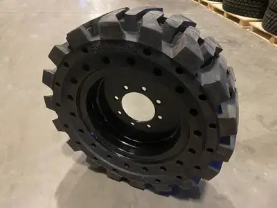 NEW 12X16.5 & 10X16.5 SOLID RUBBER SKID STEER TIRE & RIMS SET OF 4 SKU# 1267126 12-16.5 SALE $3595.0...