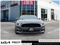 Experience the thrill of driving a 2017 Ford Mustang GT Premium Convertible in a stunning shade of g... (image 1)