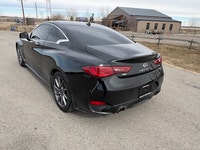 The 2017 Infiniti Q60 Premium is a luxurious 2-door coupe, often featuring a 300-horsepower 3.0L twi... (image 5)