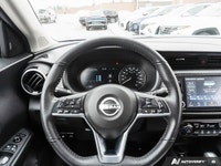Command attention in this former daily rental vibrant Electric Blue Metallic 2024 Nissan Kicks SV, e... (image 9)