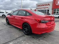 Command attention in this vibrant Rallye Red 2022 Honda Civic Sedan Sport, engineered to make every... (image 6)