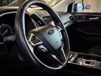 Stock#: 260167AThe 2019 Ford Edge Titanium AWD is a mid-size, five-passenger crossover SUV that sits... (image 4)