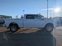 The 2026 Ram 3500 Laramie Crew Cab in Bright White combines heavy-duty capability with premium comfo... (image 7)