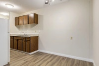 Amenities: Heat & Water Included • Spacious Rooms • Balconies Suite & Building: One-bedroom suites S... (image 4)