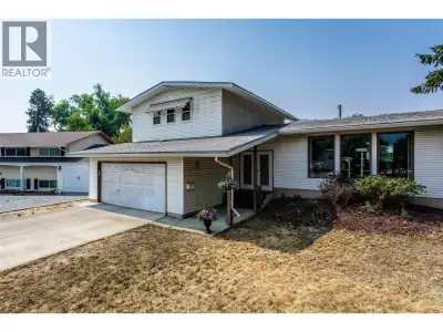 Welcome to this spacious 5-bedroom, 3-bathroom split-level home in one of Glenmore's most sought-aft...
