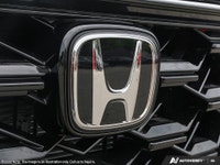 Experience the pinnacle of luxury and performance with the 2026 Honda CR-V Hybrid Touring AWD in stu... (image 8)