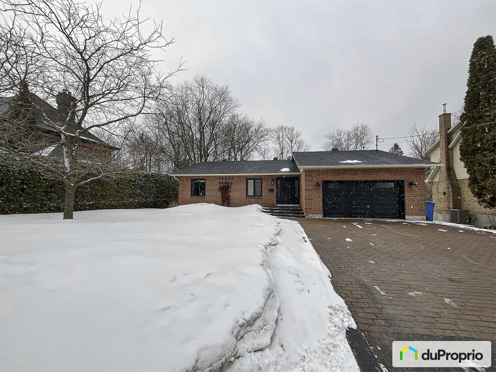 $925,000 - Bungalow for sale in Rosemere — photo 1
