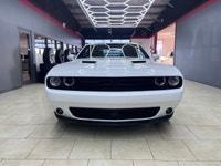 Experience the thrill of driving the 2020 Dodge Challenger SXT in stunning White. This RWD coupe bri... (image 1)