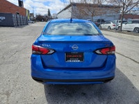 Buckle up, because this 2023 Nissan Versa SR CVT in Electric Blue Metallic isnt just a carits your t... (image 5)