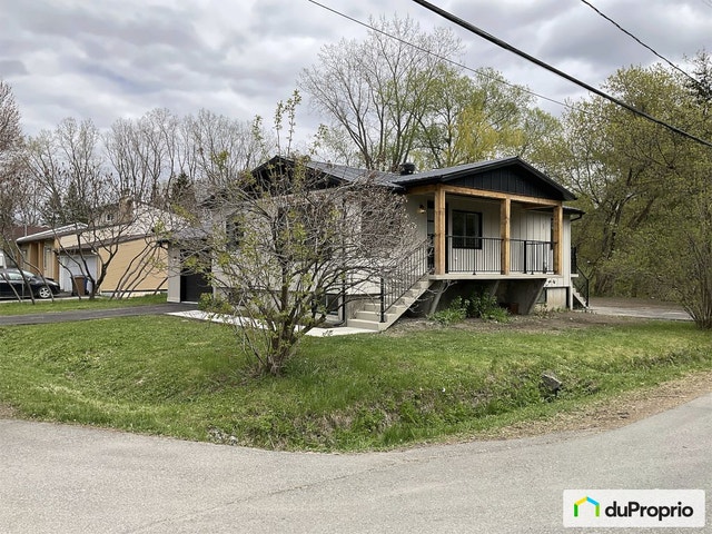 $569,999 - Bungalow for sale in L'Assomption — photo 1