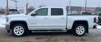 Welcome to Capital GMC! Looking for more luxury in the All New GMC Sierra? This 4WD White Sierra SLT... (image 1)