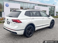 This Volkswagen Tiguan delivers a Intercooled Turbo Regular Unleaded I-4 2.0 L/121 engine powering t... (image 4)