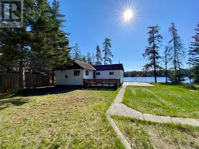 Seasonal cottage on Nellie Lake. Great view and nice size lot, just shy of an acre, (Approx. 0.71 Ac...