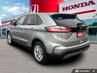 Command the road and embrace adventure in this sophisticated 2023 Ford Edge SEL, striking in Silver.... (image 3)