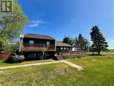 ARCHITECTURAL HOME ON THE EDGE OF TOWN! Step into this character filled 3 level split home with a fa...