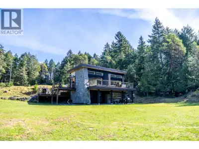 Private, peaceful, and surrounded by nature. This 5+ acre property feels like its own world offering...