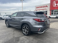 Command sophisticated comfort for every journey in the spacious 2019 Lexus RX 350L, gleaming in an e... (image 6)