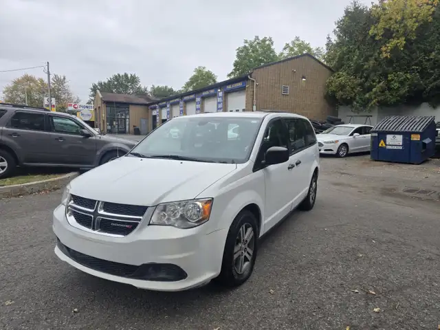 2018 Dodge Caravan 159000 km comes safety + 1 year gold warranty