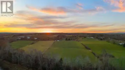 Wow! Check out this 9.29 acre piece of cleared land overlooking the River John just minutes outside...
