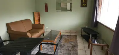 furnished bright 1 bedroom unit close to downtown. fridge/stove . Central AC. Includes Utilities exc...