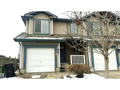 Well-maintained end-unit half duplex located in the desirable community of MacEwan in Southwest Edmo...