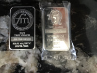 Two 5oz silver bars of .999 pure silver 