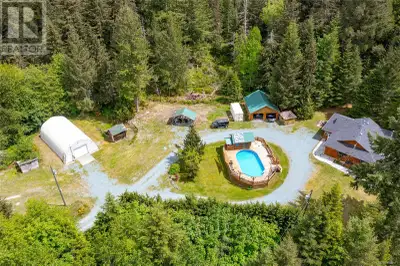 Perched on a hilltop overlooking forests & mountains this lovely main lvl entry w/walkout basement h...