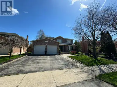 In The Centre Of Sought After Glen Abbey, With Great Schools , Backed On Ravine And Trail, No Houses...