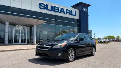 Nouvel Arrivage! La Subaru Impreza Touring 2014 est une voiture compacte reconnue pour sa fiabilité,...