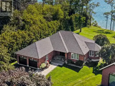 Perched at the eastern edge of Cobourg's waterfront, this home offers a rare duality: the convenienc...