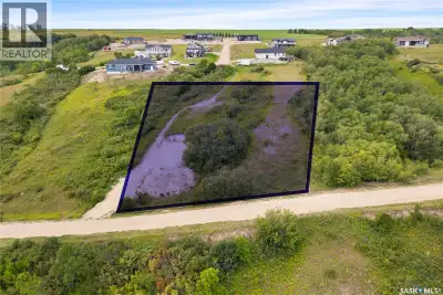 Welcome to Berry Hills Estates, where opportunity meets breathtaking beauty. Perched above Katepwa L...