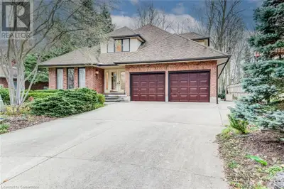 Welcome home to 225 Corrie Crescent, this one-of-a-kind, custom-built home located on a quiet, tree-...