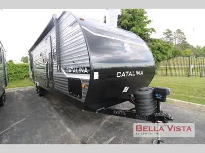 Coachmen Catalina Legacy Edition travel trailer 323BHDSCK highlights: Private Bunkhouse Two Bunk Bed...