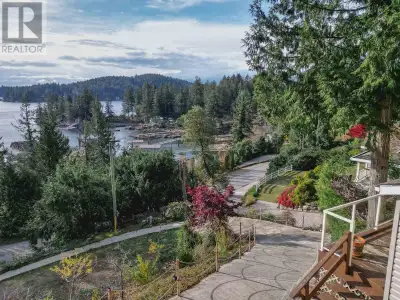 Discover this inviting rancher with beautiful ocean views, located across the street from Hospital B...
