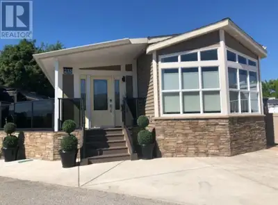 Exquisite Park Model home is priced to sell! The luxurious, open concept kitchen features custom Kek...