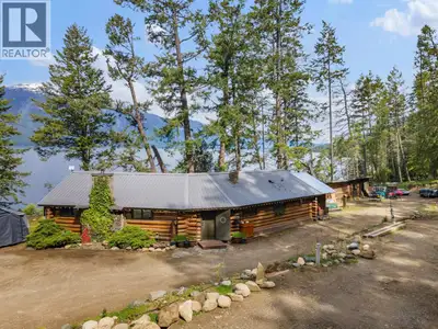 Welcome to your very own lakeside escape—where rustic luxury meets pure serenity. Nestled on 3.54 pr...