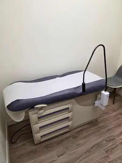 Midmark Examination Table with Welch Allyn Light, View more