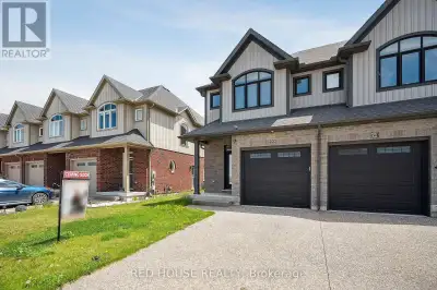 Welcome to this Modern 3-Bed, 4-Bath End-Unit Townhome with Finished Basement & Separate entrance! T...