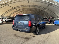This Chevrolet Suburban boasts a Gas V8 5.3L/325 engine powering this Automatic transmission. Wipers... (image 4)