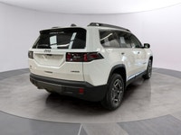 The 2026 Jeep Cherokee Laredo, with its pristine White exterior and 4x4 drivetrain, offers a robust... (image 4)