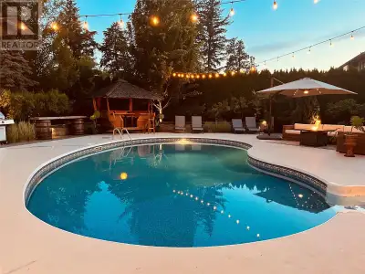 Exceptional estate in Kelowna’s sought-after Lower Mission: 7 bedrooms, 5 bathrooms, and over 5,700...