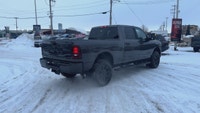 This 2025 RAM 3500 Big Horn Night Edition 4x4 Crew Cab 64 Box has the 6.7L Cummins I-6 Ho Turbo Dies... (image 4)
