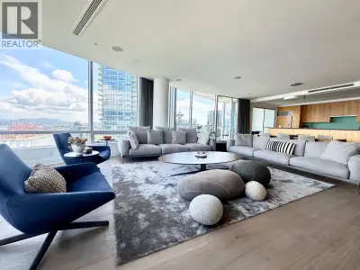 Experience luxury living in this beautifully furnished two-bedroom condo in Vancouver, offering an e...