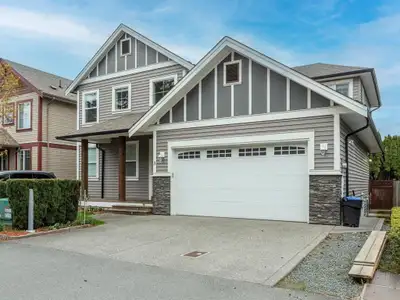 Views of MT Cheam from huge windows in great room. Large patio deck over looking backyards toward Mt...